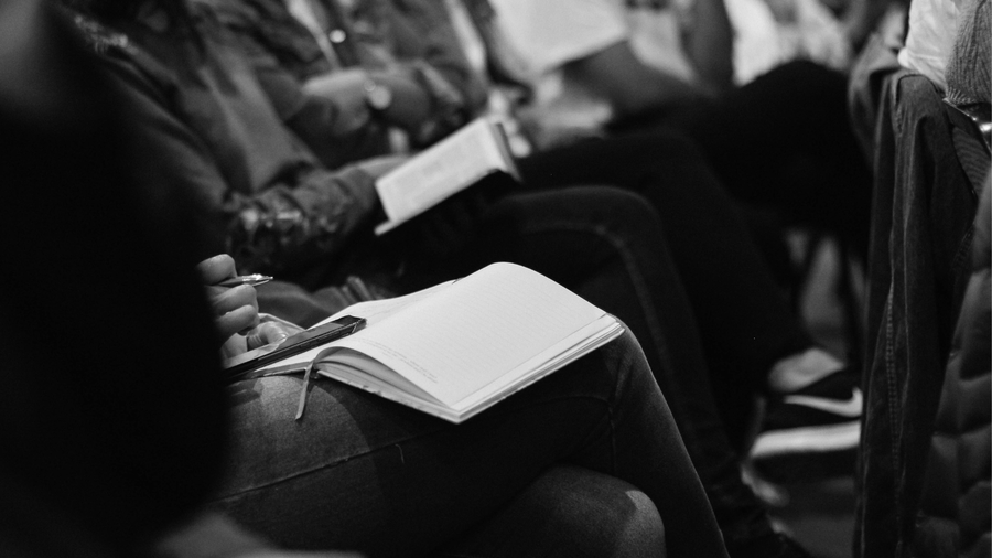 Student at a lecture studying